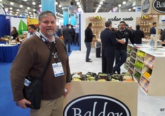 Rick Sible of Rice Lake Farms walking the floor. His company grows the beets and turnips that Baldor Specialty Foods turns into veggies noodles (next to him).